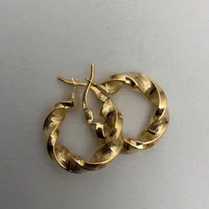 Elegant Gold Color Twisted Hoop Earrings for Women - Classic Design with Secure Clasp Closure