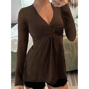 Elegant women’s autumn–winter long-sleeve A-line loose knit top, solid-color V-neck casual slim-fit style