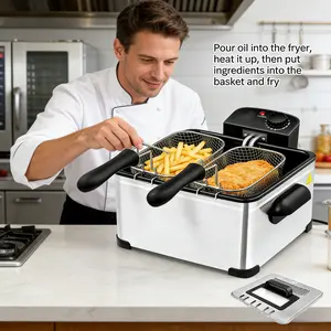 1400W 5L electric frying pan with 3 frying baskets, adjustable temperature, observation window cover, stainless steel pot body on the countertop, very suitable for kitchen and household fish frying, American standard three plug