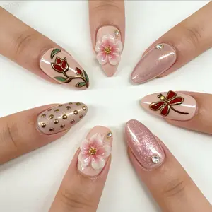 Elegant Floral and Glitter Nail Art Set with Rhinestones and Gold Accents for a Chic Look cur almond medium shape( size medium)
