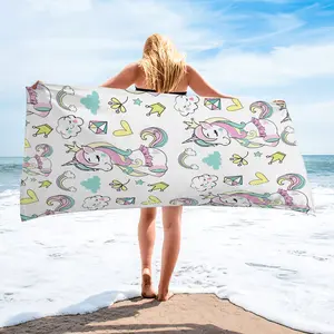 The Vibrant Pink Unicorn Beach Towel, made from lightweight, absorbent, and quick-drying fabric, is perfect for relaxing by the pool, beach trips, and summer celebrations—making it a trendy gift for her.
