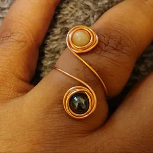 Crystal Copper Ring with Unique Swirl Design and Gemstone Accents for Stylish Accessory