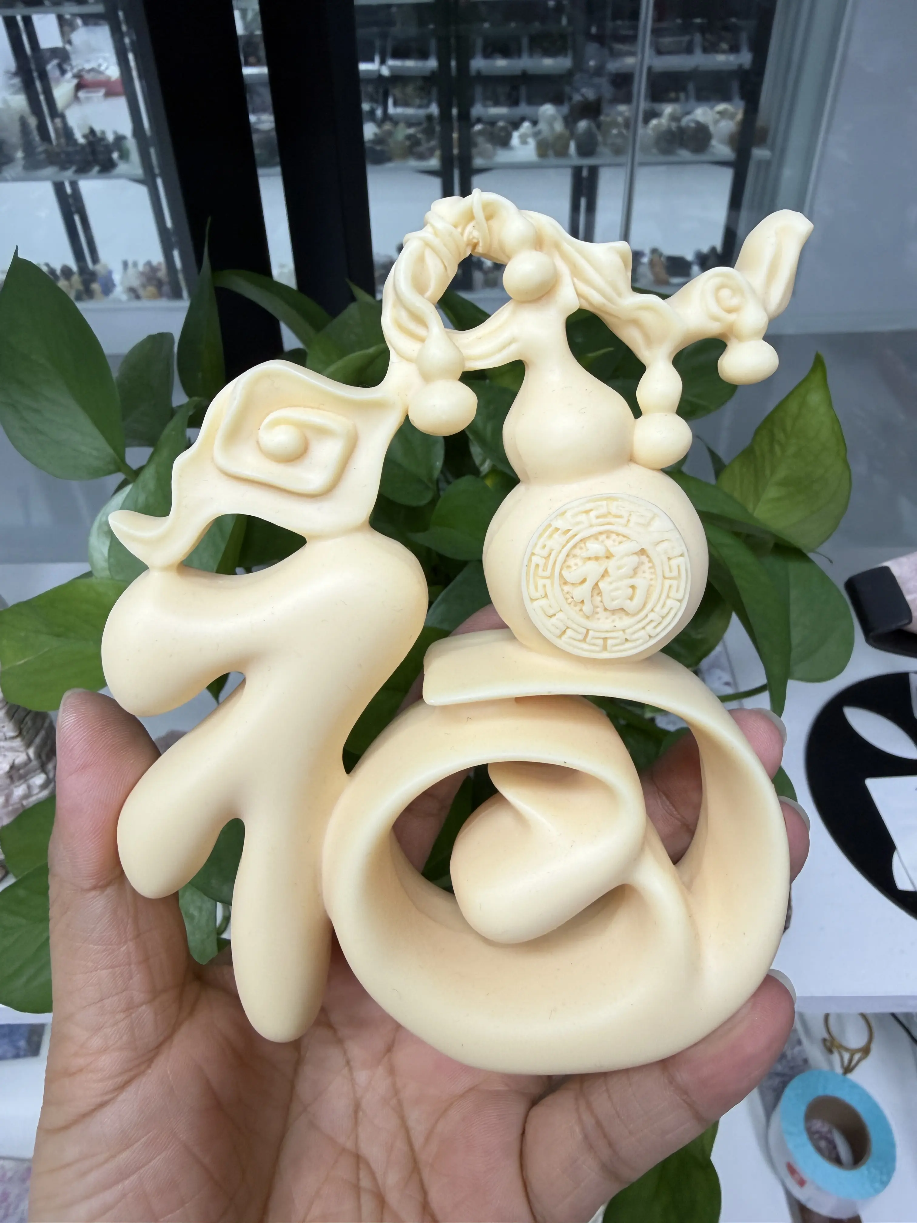 Mia(15559)gc.Tagua Nut Fu Character Sculpture Gourd Ornament, a blessing home decor symbolizing fortune and health.