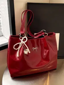 Niche   retro burgundy one-shoulder tote bag, glossy design  practical  casual  versatile shoulder bag, exquisite matching with pearl love pendant, sweet and versatile for daily commuting, shopping and dating, etc. Elegant Commuter Bag