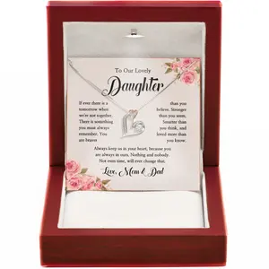 To Our Daughter Necklace - Love Knot Jewelry Gift from Mom and Dad with Heartfelt Message Card for Birthdays Graduations or Weddings