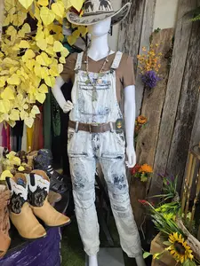 Distressed stitched nicely weighted denim overalls.