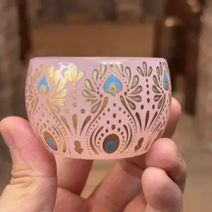 Pink Glow-in-the-Dark Cup with Intricate Gold and Blue Peacock Feather Design for Unique Lighting and Stylish Decor
