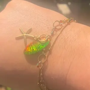 Rastafarian Style Fishing Lure Bracelet with Starfish Charm and Colorful Beads for Fashionable Fishing Enthusiasts