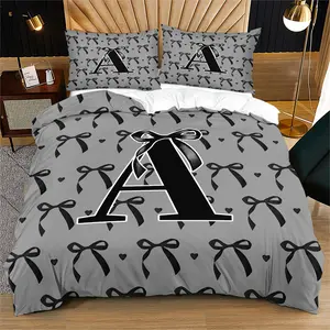 2/3-Piece Decorative Bedding Set: Black Bow & Letter Pattern Duvet Cover with Zipper Closure. Soft, breathable fabric, easy-care, ideal for bedroom decor.