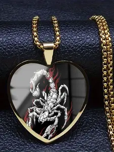 A transparent glass heart necklace with a delicate 2D retro scorpion pattern inside.