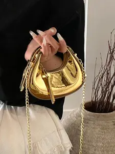 Fashionable mini exquisite handbag, crescent geometric shape, metal chain decoration, niche design fashion handbag, stylish mobile phone bag with full design sense, suitable for shopping, dating, afternoon tea, gathering and party