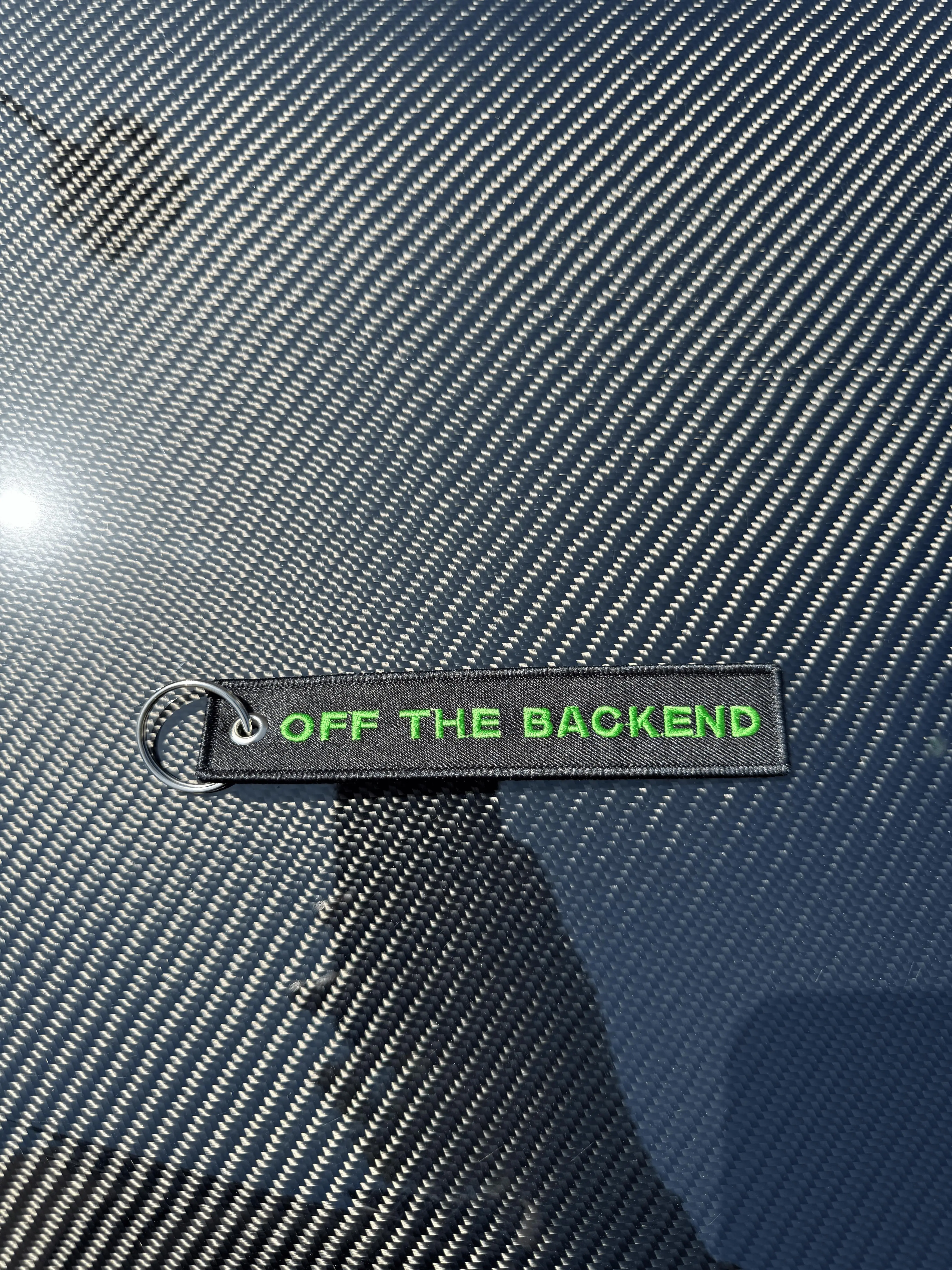Jet Tag Embroidered Key Chain - Off The Backend Design in Green and Black Colors