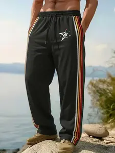 Trendy Men's Black Star Graphic Rainbow Stripe Wide Leg Track Pants, Elastic Waist Drawstring Casual Sweatpants, Y2K Streetwear Athletic Trousers for Street Style & Daily Wear #MensStreetwearPants #RainbowFashion #Y2KStyle