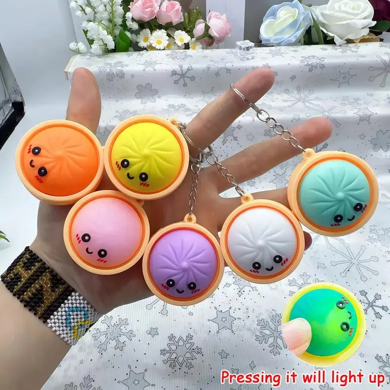 Light-Up Dumpling Pressable Fidget Keychain, PVC Food-Shaped Stress Relief Pendant, Wear Resistant Mini Cartoon Charm for Keys Backpack Bags, Portable Fidget , Party Favors, School Prizes & Holiday Gifts(Colors Sent Randomly)