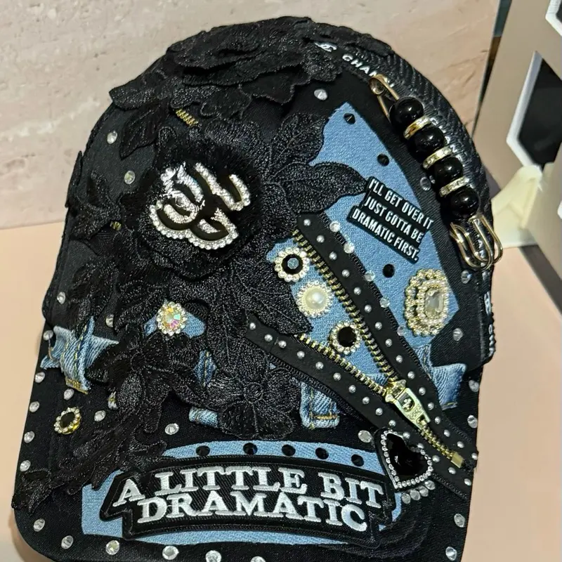 Trucker Junk Hat with Embroidered Floral Design and "A Little Dramatic" Text