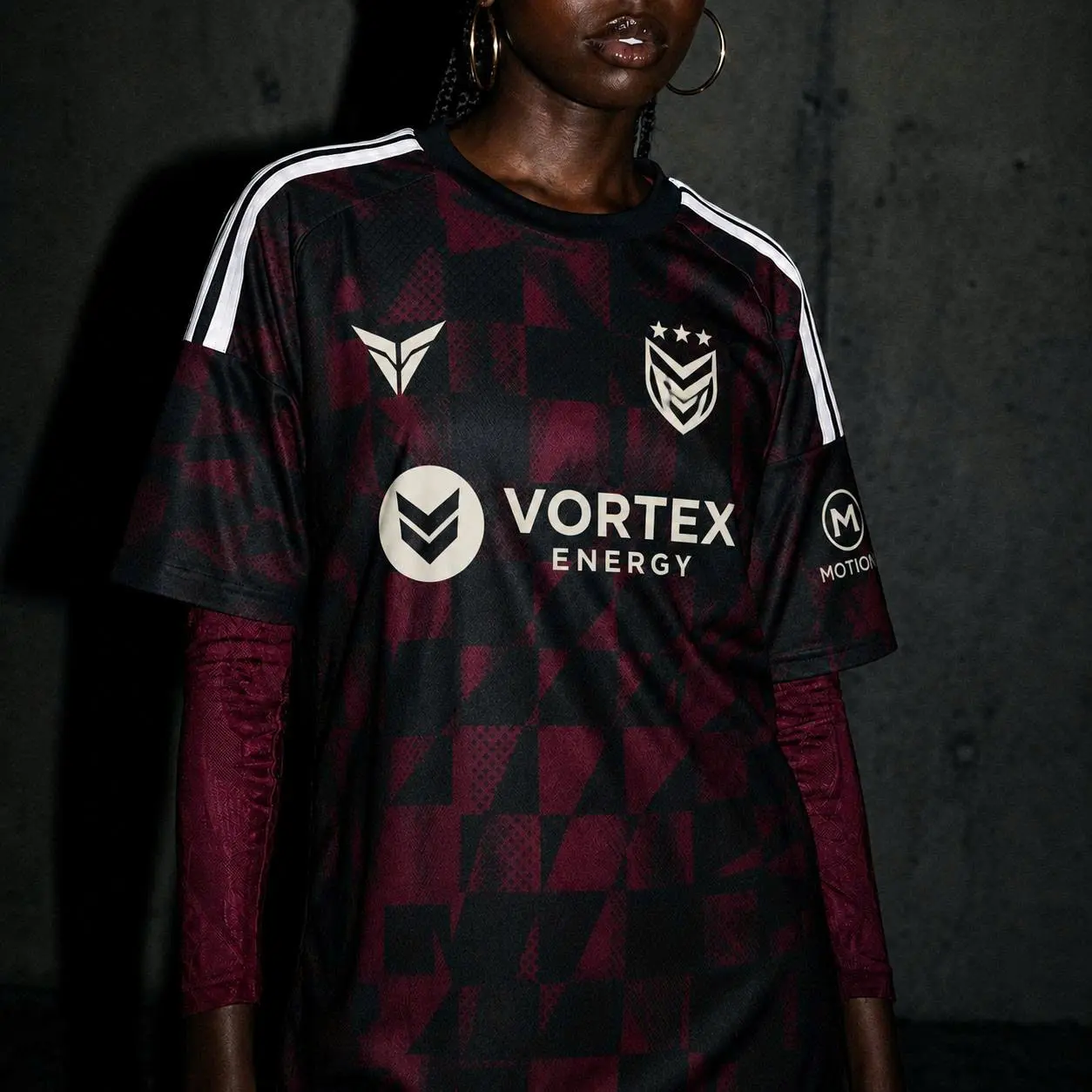 The kit in question is the 2026/27 third kit (black & dark red) – a premium third-kit style.