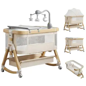 3-in-1 multifunctional baby bed, portable multifunctional bassinet that rocks and can be placed by the side of the bed, equipped with a diaper changing station, mosquito net, rotating wind chime, and storage basket, six adjustable height settings, all mes