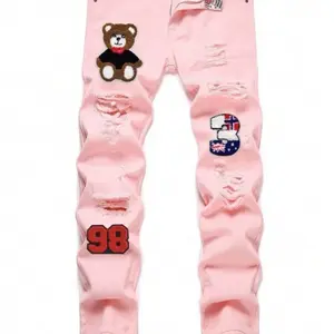 Pink Mens Jeans with Bear and Flag Patches and Ripped Design