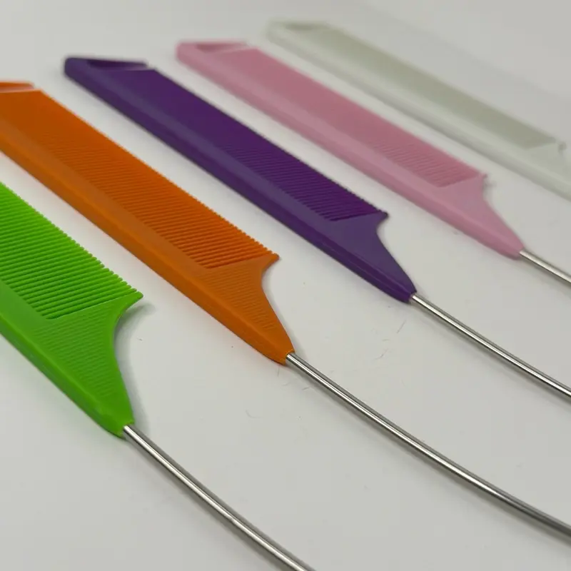 Curved metal tail comb