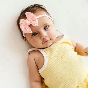 Baby Bling Baby FAB Skinny soft, thin nylon headband with small nylon bow