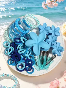 Sea salt blue summer seaside hair accessory gift pack! Complete set including plumeria hair claw, telephone cord hair tie and alligator clip. Translucent, skin-flattering and photogenic, an essential vibe accessory for sweet girls on outings.