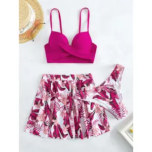 A three-piece set of thin strap bikinis with a transparent skirt