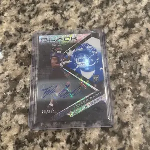 Tyler Badie Black Auto /35 Football Ravens Card with Holographic Signature and Limited Edition Design