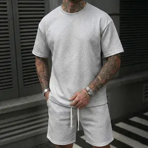 2-Pack Men’s Summer Two-Piece Set: 3D jacquard crew-neck short-sleeve T-shirt paired with drawstring shorts; loose casual athletic set suitable for everyday wear, workouts, and vacations.