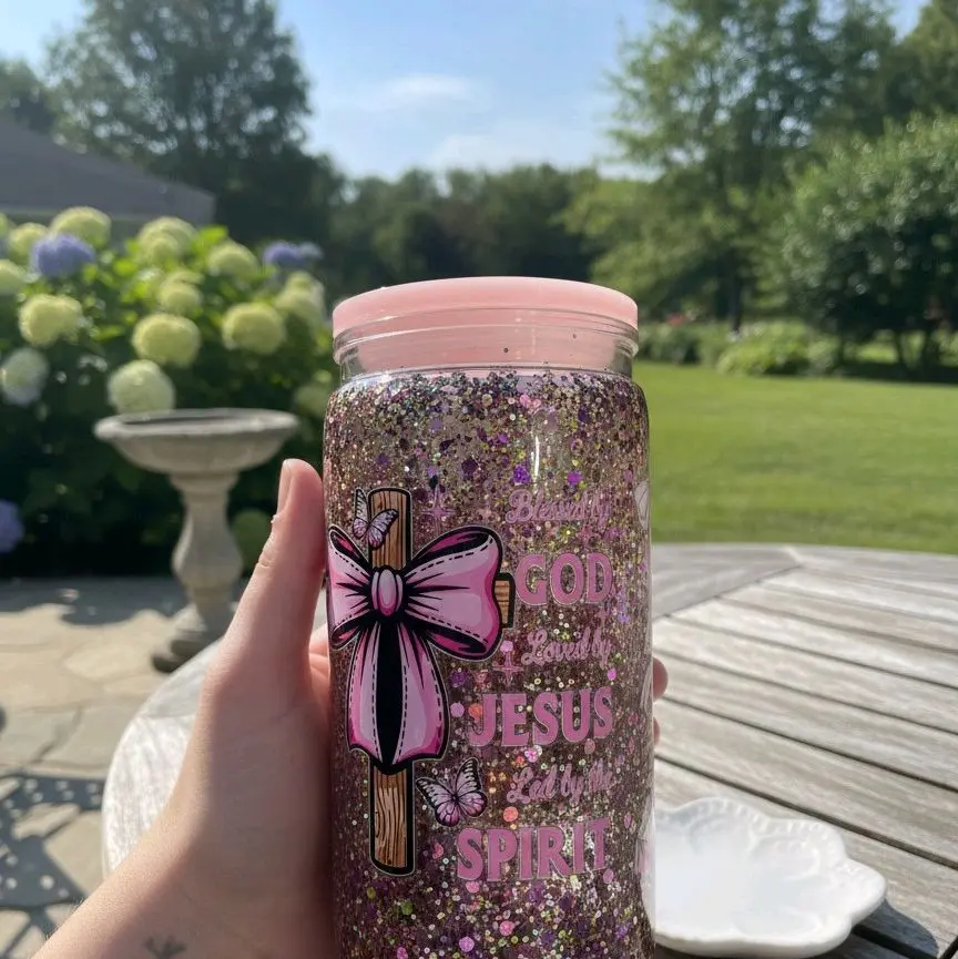 Snowglobe Glitter Tumbler with Pink Lid and Inspirational Cross Design for Daily Use