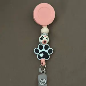 Paw Print Badge Reel: Beaded Floral Silicone ID Clip for Pet Lovers