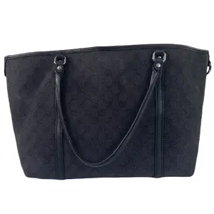 Pre-owned GUCCI GG leather handbag Gucci black GG canvas tote bag with top handles and silver hardware. qg475