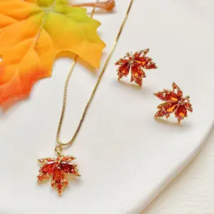 Creative and Stylish Women's  Jewelry Set with a Uniquely Designed Elegant Maple Leaf Appearance, Inlaid with Synthetic Synthetic Zirconia, Paired with Decorative Accents. Trendy, Elegant, and Versatile for Holiday Parties