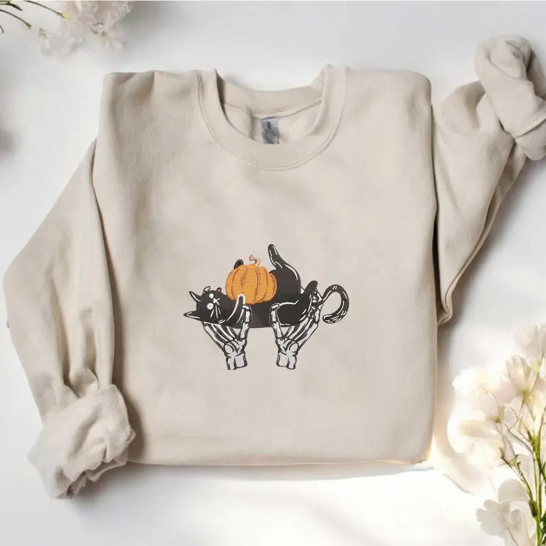 Skeleton Holding Black Cat Halloween Embroidered Sweatshirt - Spooky Cat and Pumpkin - Cute Halloween Sweatshirt for Women