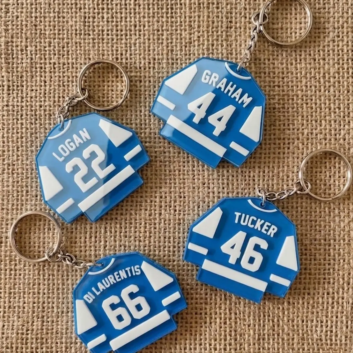 Campus-inspired hockey jersey keychain, a gift for book lovers, Briar University hockey love keychain, Booktok Merch love-themed bag accessory.