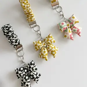 Scrunchie Wristlet with Mini Puffy Bow Retro Floral Pattern Silver Color Clasp Perfect for Everyday Use Fashion Accessory