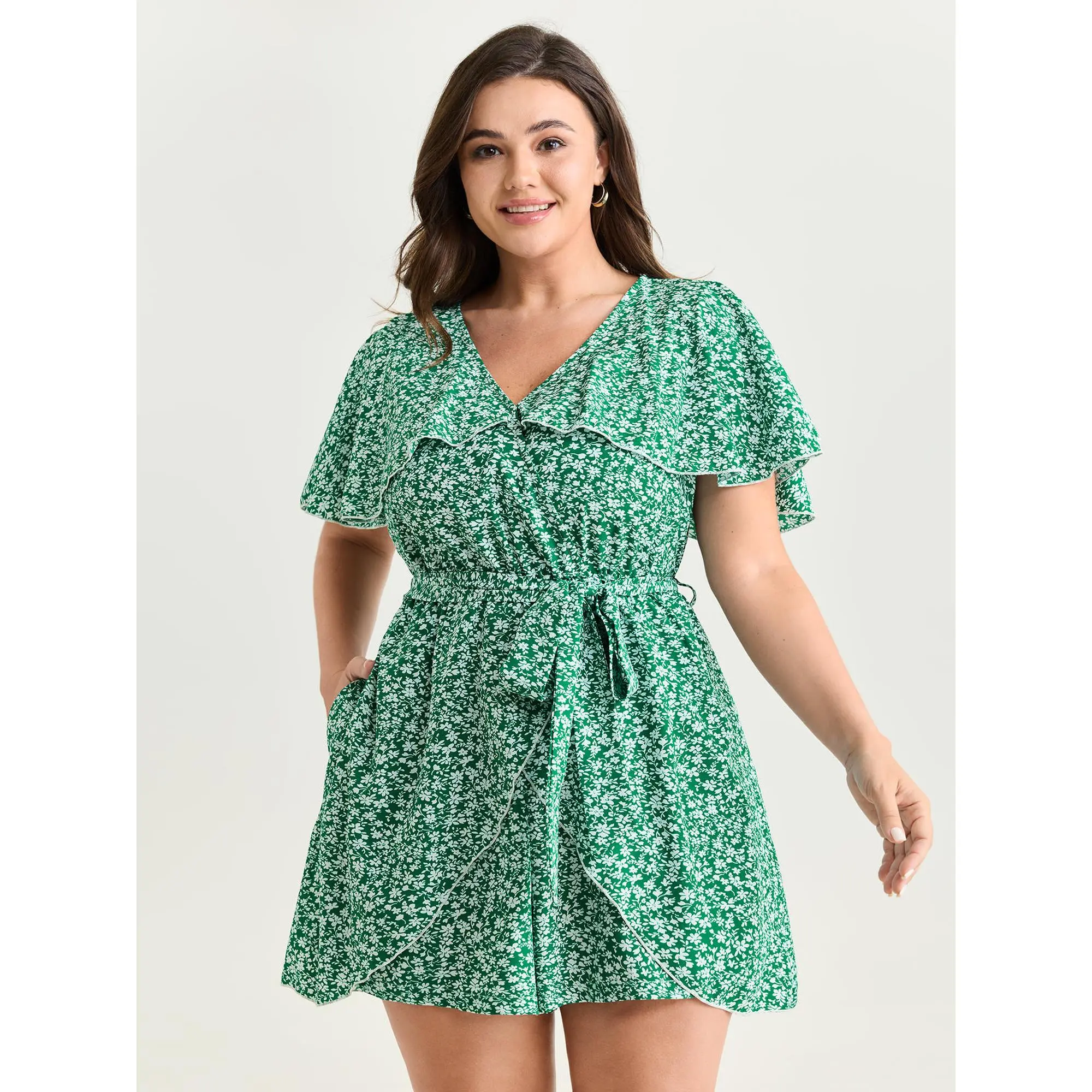 BloomChic Women's Plus Size Ditsy Floral Overalls, Shortsleeve Spandex Blend Wrap Romper with Ruffle Hem