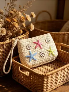 Boho woven straw wristlet decorated with starfish and shells. Mini crocheted raffia coin purse with zipper, handy for keys, cards and small items. Ideal for beach, daily use and various gifts.