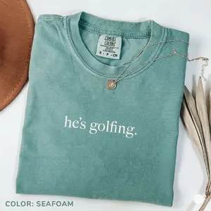 He's Golfing Shirt, Golfing Season Shirt, Golfer Wife Shirt, Golfing Mom Shirt, Golf Player Shirt for Mom, Golf Lover Shirt, Oversized cotton fitted women's shirt