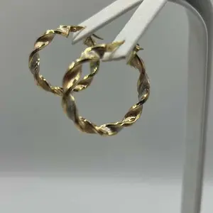 Earrings made of 3 layers of 10K gold