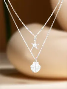 A stylish and elegant double-layer pendant necklace with shell and starfish designs, Dainty Layering Jewelry, perfect for daily wear, vacations, dates, and other occasions. It also makes a surprisingly exquisite little gift.