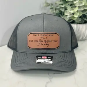 Hat that says “can’t choose your dad but you can choose your daddy”