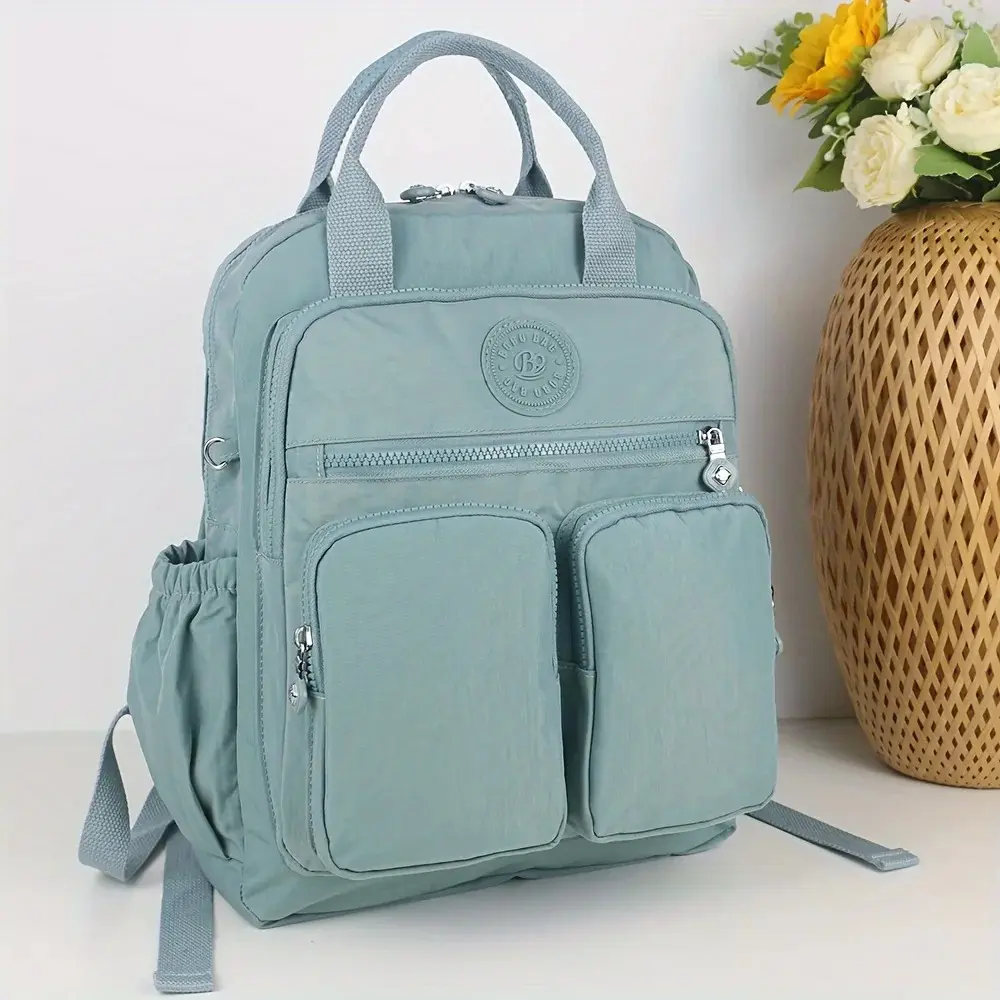 Large Capacity Lightweight School Backpack, Multi-pocket Travel Bag, Wear-resistant Nylon Material, Comfortable Shoulder Straps.