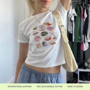 Seashell Collage Baby Tee – Vintage Coastal Graphic, Beachy Summer Aesthetic Outfit