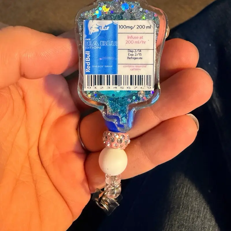 IV badge reel. Personalize label and filling. Beads available. IV bag.