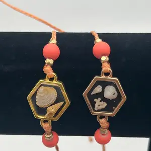 Mini seashell bracelet/gold tone-peach cord-coral glass beads