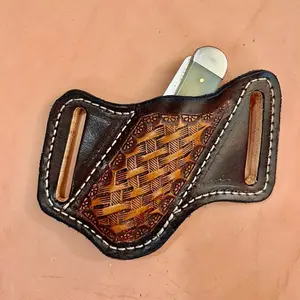 Hand tooled trapper leather sheath