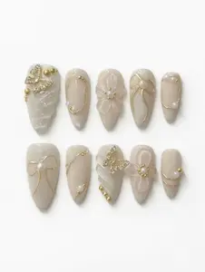 10-piece 3D press-on nails with floral and bow designs (almond shape) | reusable acrylic false nails with pearl and gold details | soft, elegant light luxury style