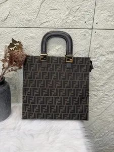Pre-owned FENDI Handbag Classic Logo Design with Gold Hardware and Brown Leather Handles