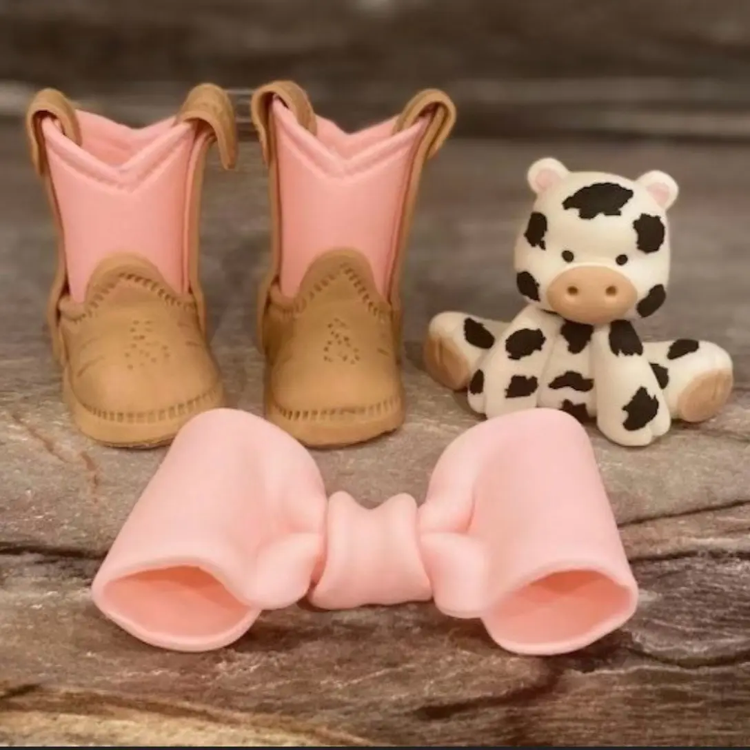 Fondant Boots, cow, and bow cake toppers