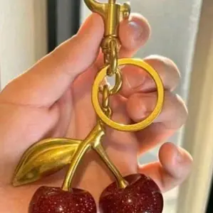 No cancel cherry bag charm